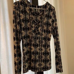 Free People lace up long sleeve shirt. V-Neck.